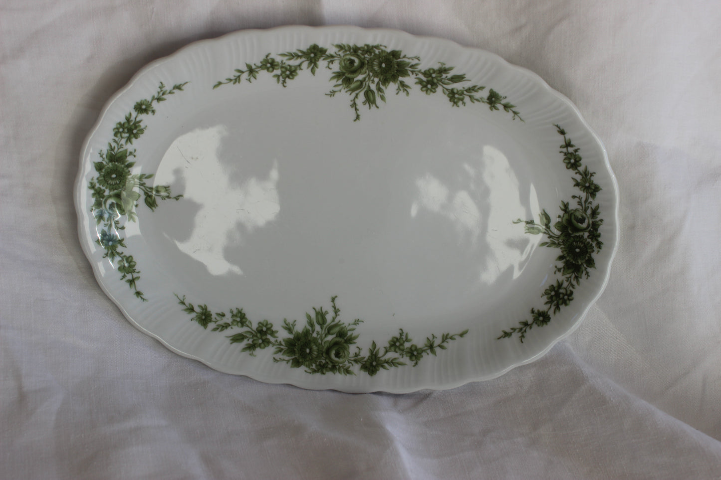 White serving platter with green floral pattern