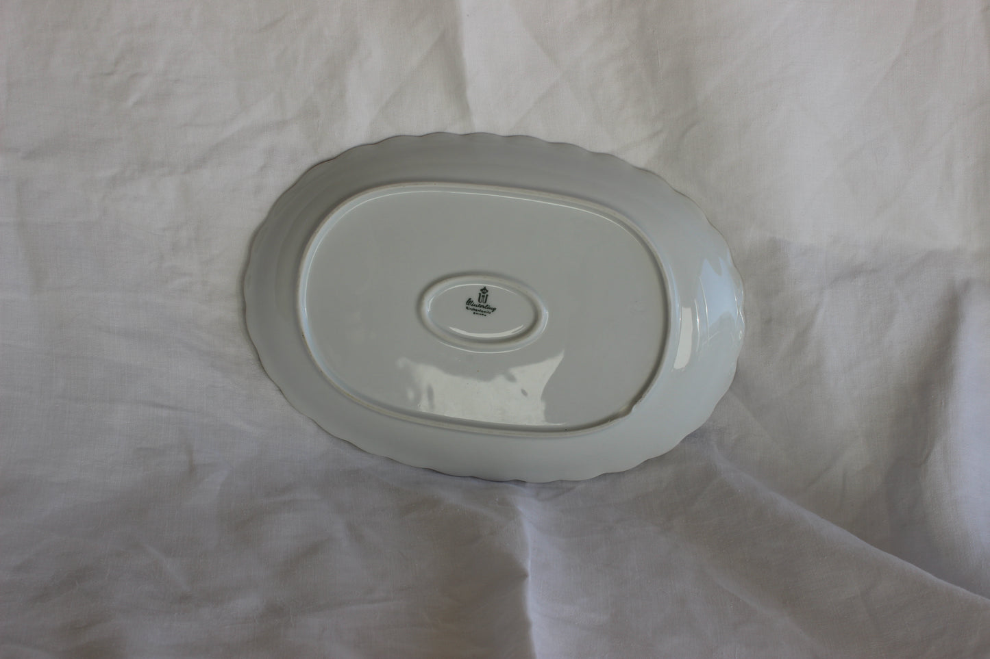 White serving platter with green floral pattern